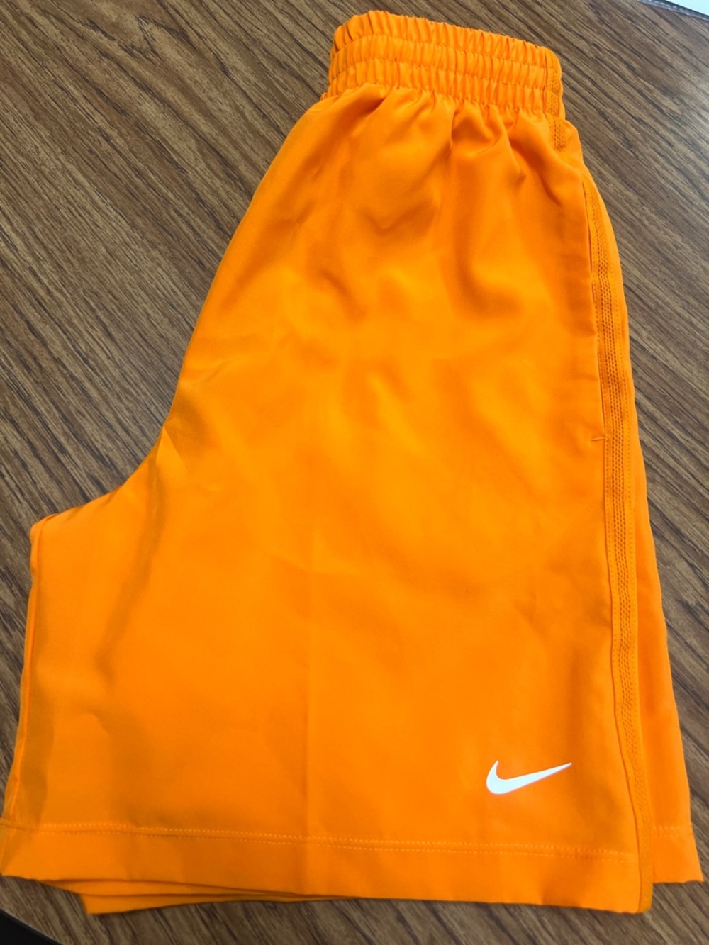Nike Bright Orange Performance Shorts with White Swoosh